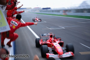 Ferrari cross finish line first and second