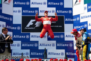 Michael Schumacher jumping on podium