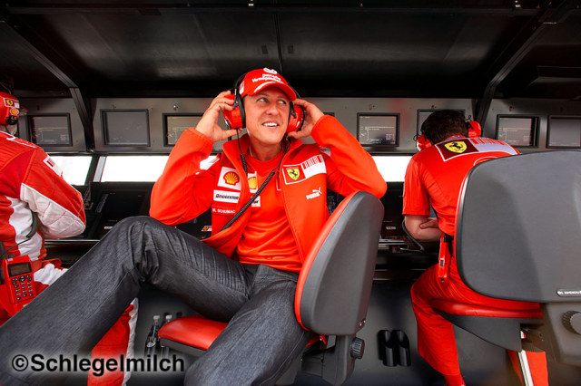 Michael Schumacher on pit wall