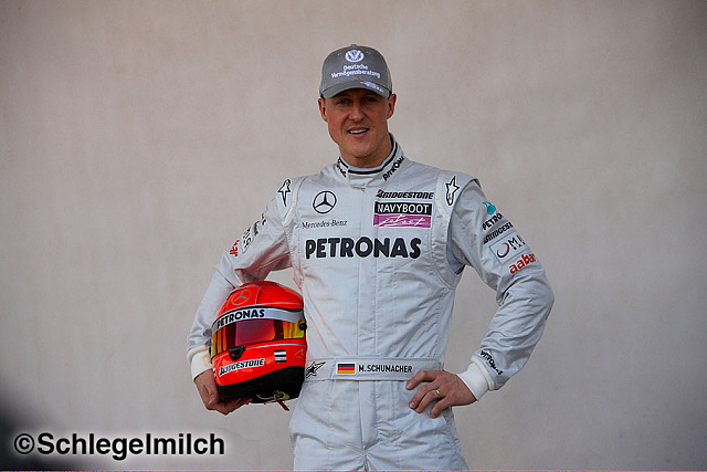 Michael Schumacher in Mercedes driving suit with helmet