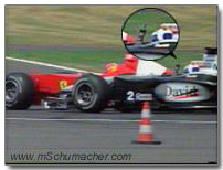 Coulthard shows finger to Schumacher